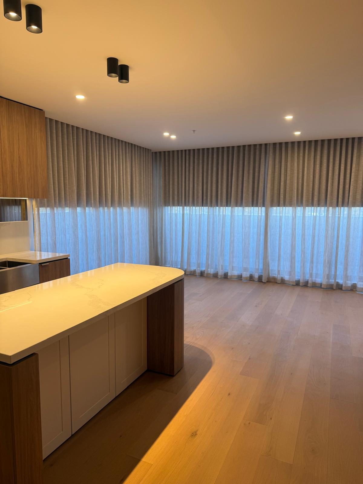 Apartment kitchen island and floors cleaned for handover