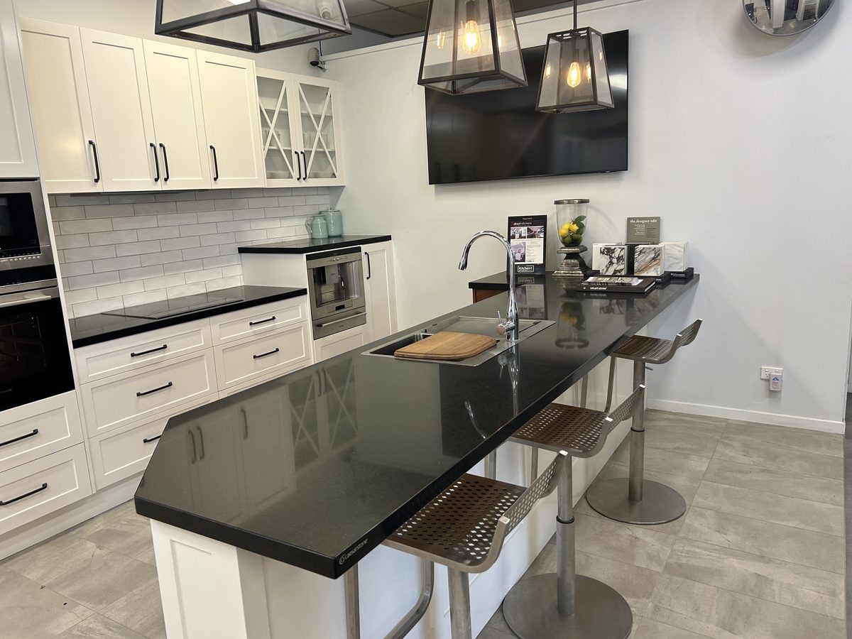 Kitchen benchtops and splashback degreased and polished